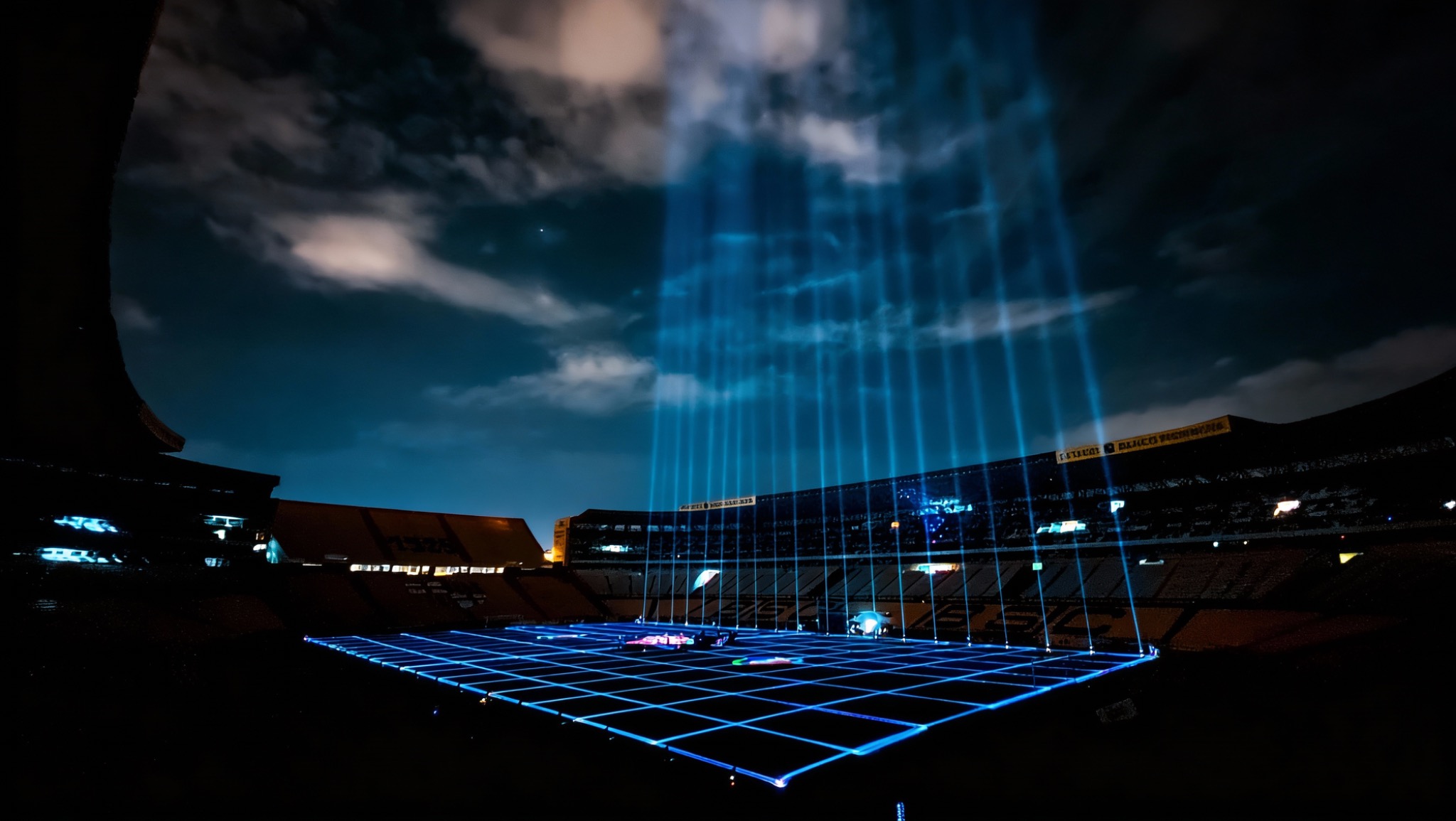 Futuristic stadium illuminated with blue light beams and projection mapping
